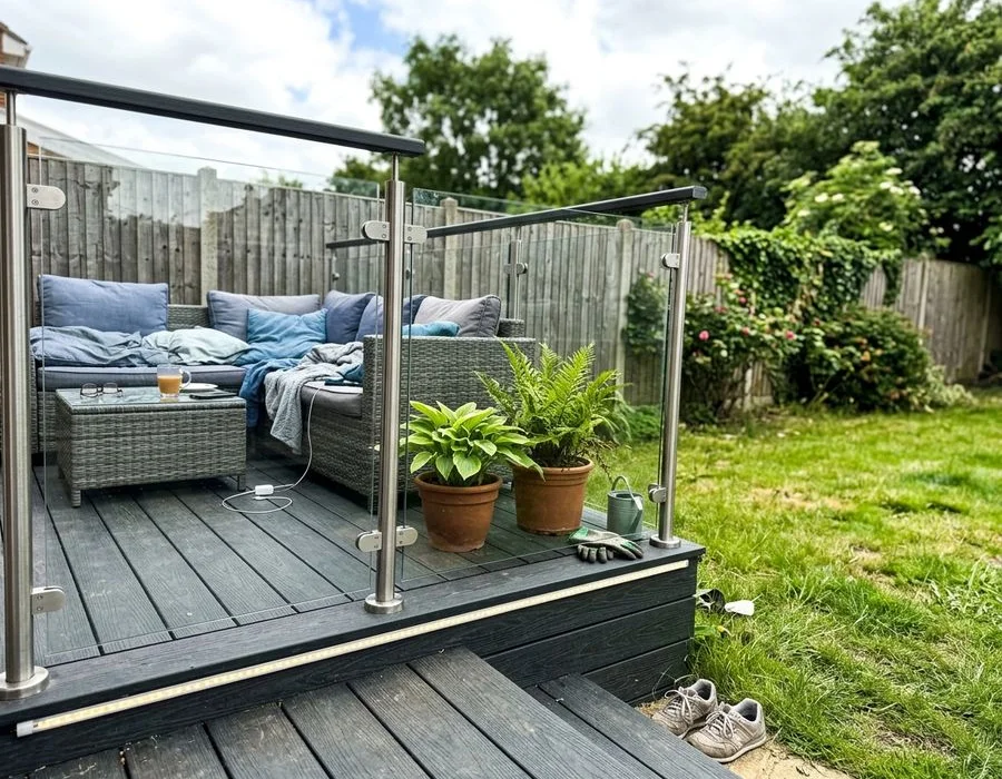 Composite decking with glass balustrade in a Bedford garden